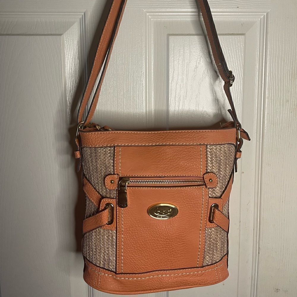 B.O.C Born Concept orange faux leather and tan straw bucket style shoulder bag